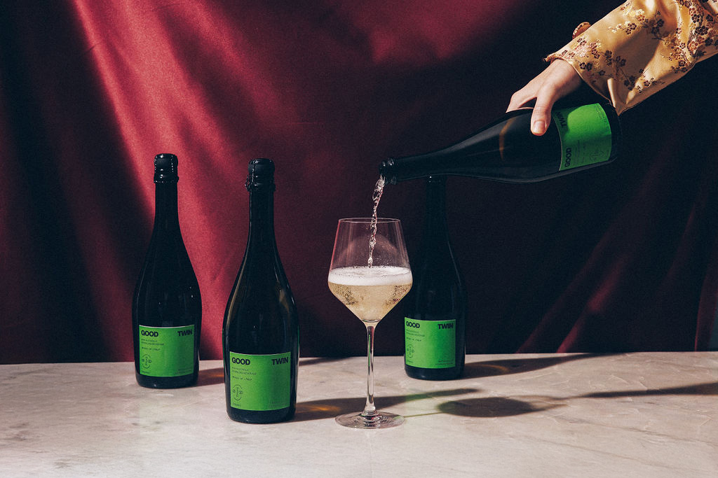 Good Twin — pour shot with bottles